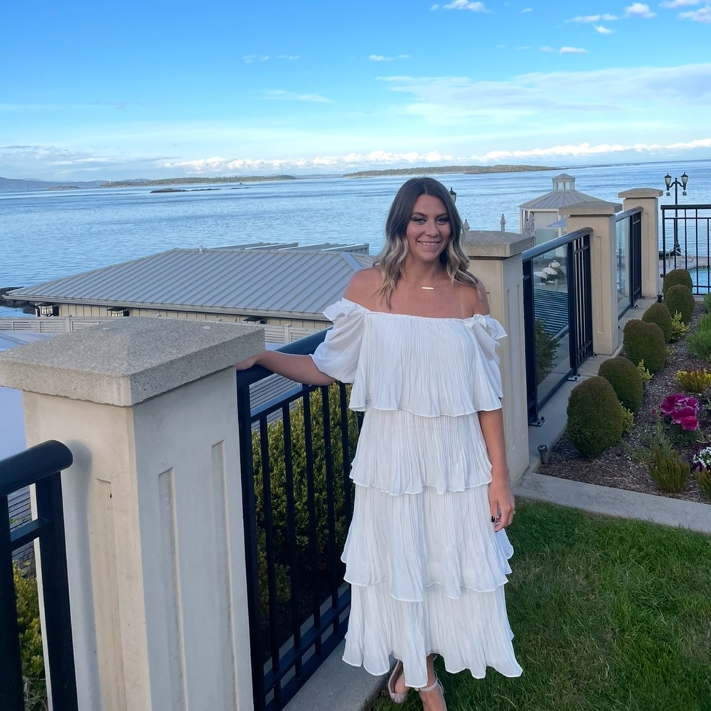 Vici white teared dress.